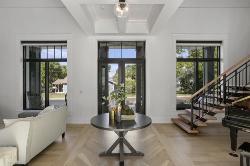 Front room with the staircase and piano