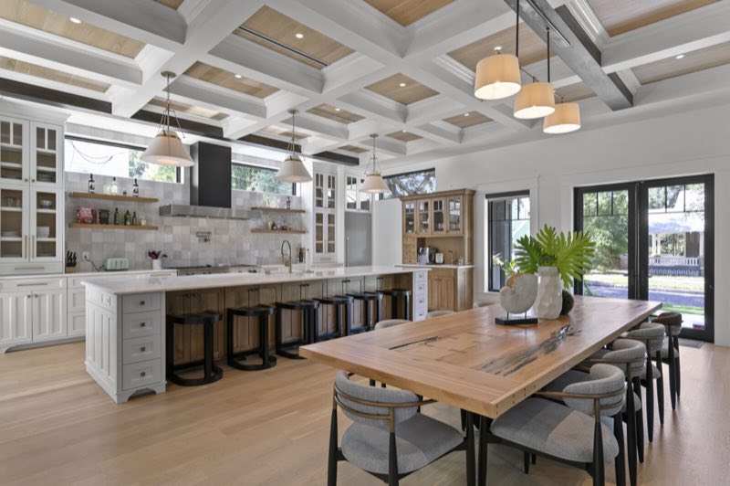 Kitchen and dining room with the custom wood table