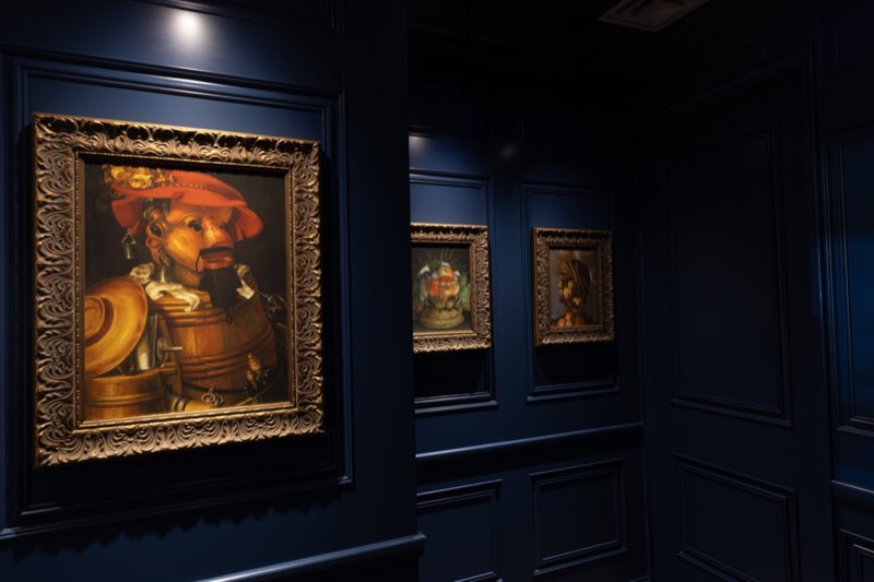 Navy panelling and a framed oil painting