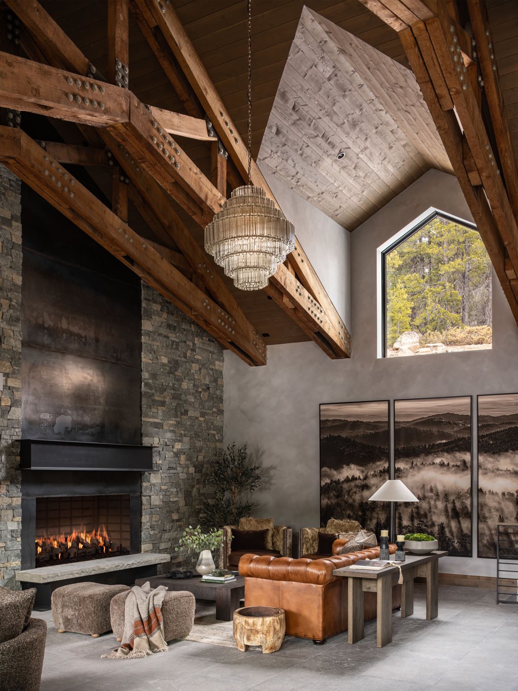 Great room at Saorsa Ranch with cedar timber trusses and limewash walls